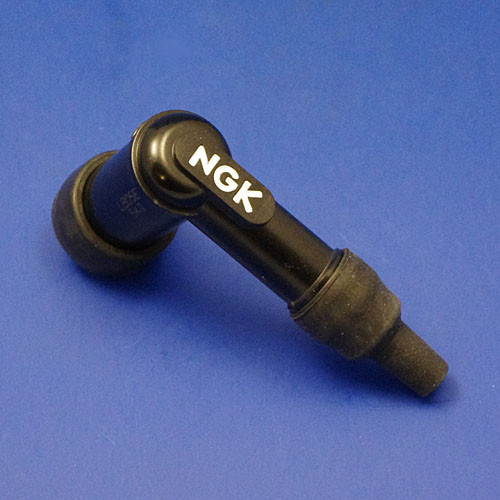 Right angled suppressed spark plug cap