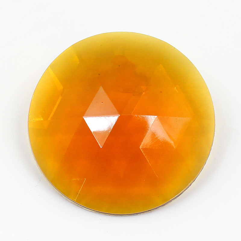 Prismatic amber glass lens